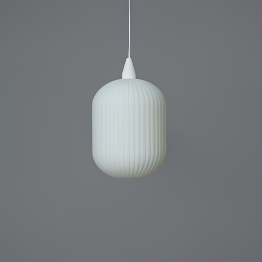 Mittelgroßer Kürbis-Leuchtkörper „sieben“ von Die Edelweissen, orangefarbene Leuchte mit beleuchteter Oberfläche