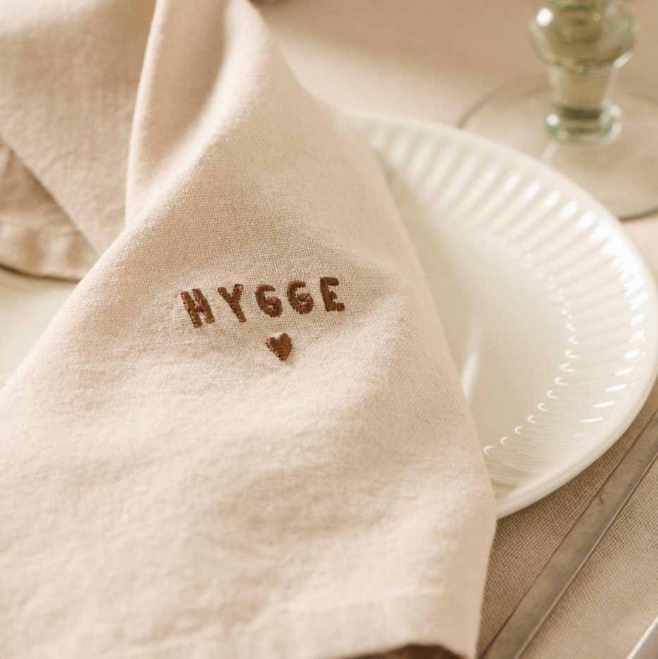 Stoffserviette "Tradition" mit Hygge leinenfarbig