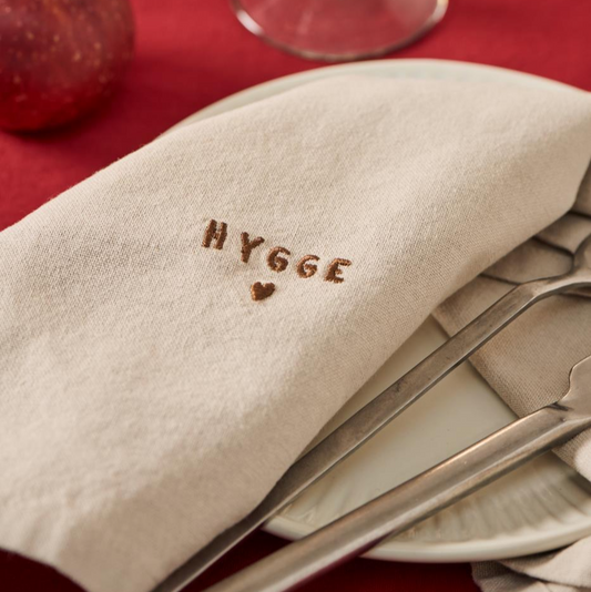 Stoffserviette "Tradition" mit Hygge leinenfarbig - Wohnen auf dem Land