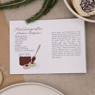Buch "Weihnachtliche Lieblingsrezepte aus Småland" von verblühmeinnicht, Cover mit weihnachtlichen Designelementen und Rezeptbilder