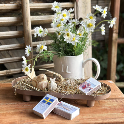 Boltze "Manon" metal tray with a maritime-themed matchbox on a wooden surface.