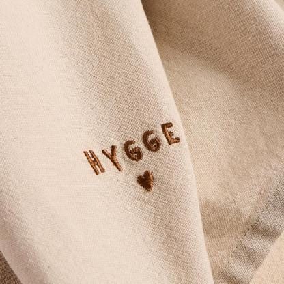 Stoffserviette "Tradition" mit Hygge leinenfarbig
