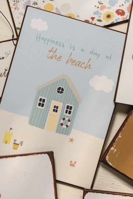 Schild "Happiness is a day at the beach" Strand Motiv Metall - Wohnen auf dem Land