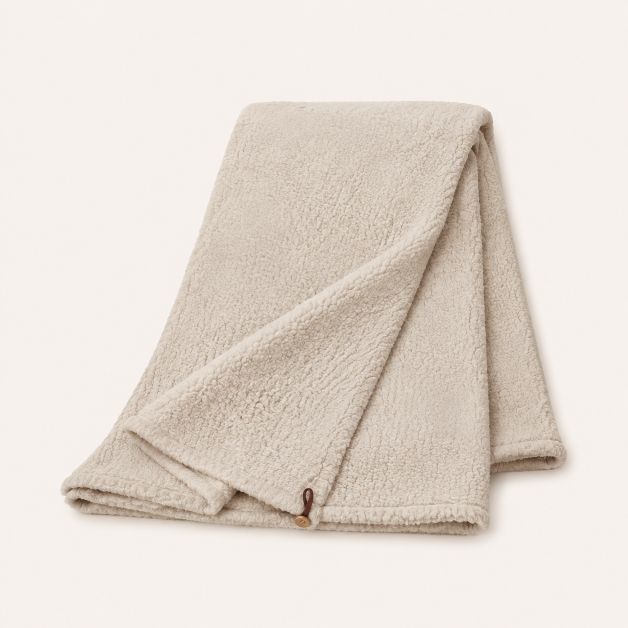 Plaid Wohndecke Teddy in Taupe freigestellt